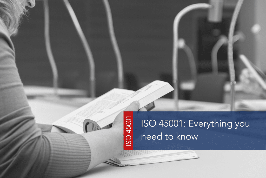 ISO 45001 Everything you need to know MAIN Person reading a book sat at a table