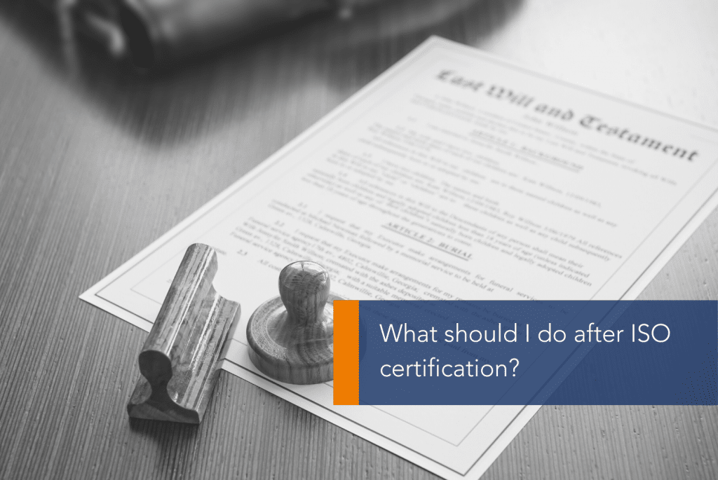 What should I do after ISO certification MAIN A certificate and stamp on a table