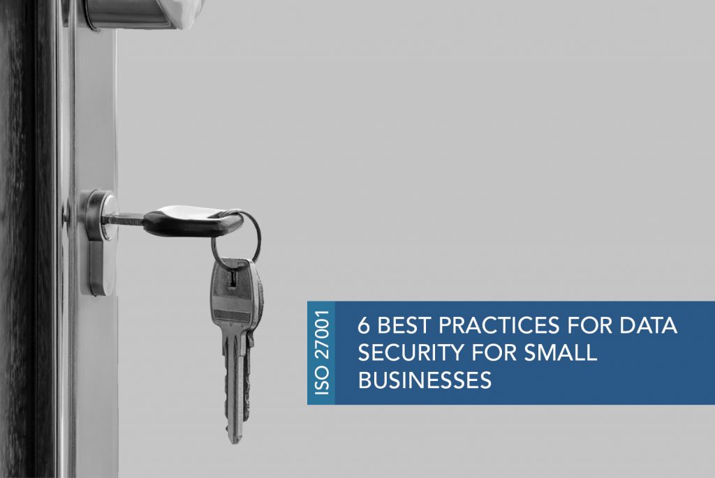 Black and white image of a set of keys and one turned horizontally in a lock