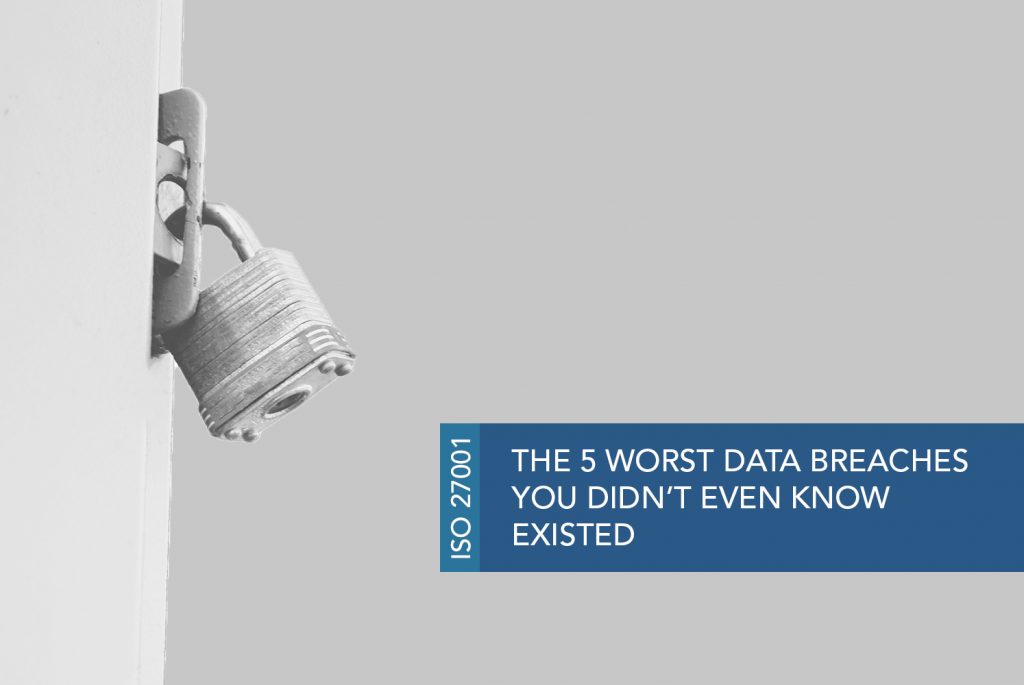 Black and white image of a metal padlock sealing a door