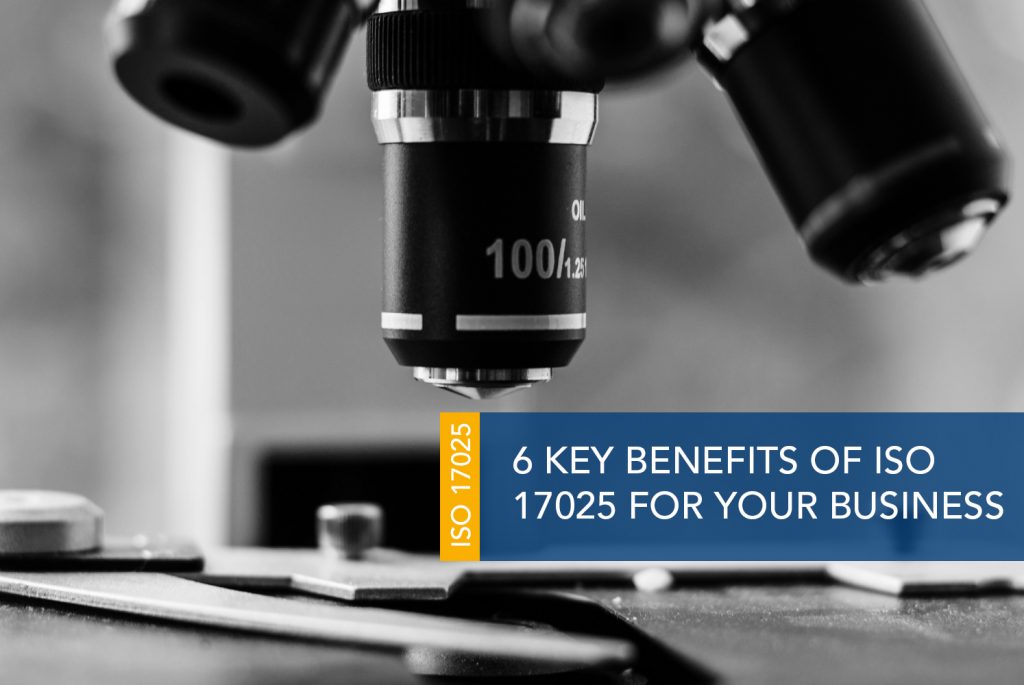 A black and white image of microscope objective lenses up close